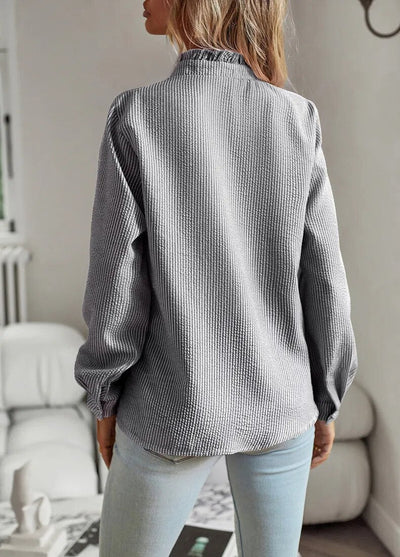 Grace I Blusa con botones y volantes