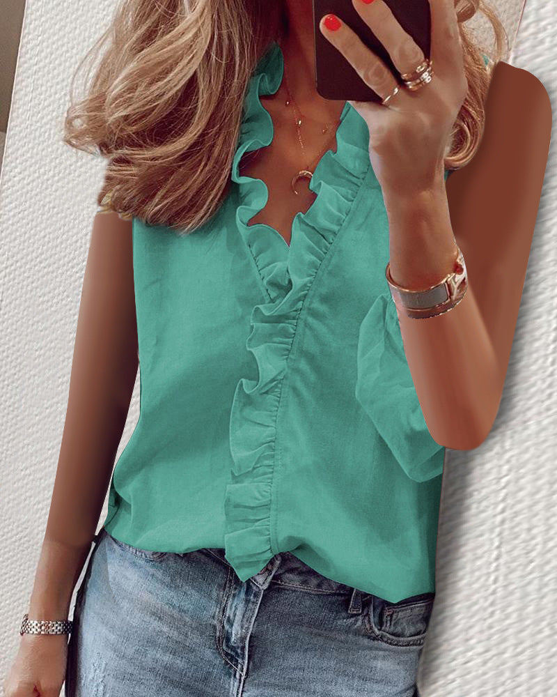 Sophie – Blusa sin mangas con cuello en V y volantes